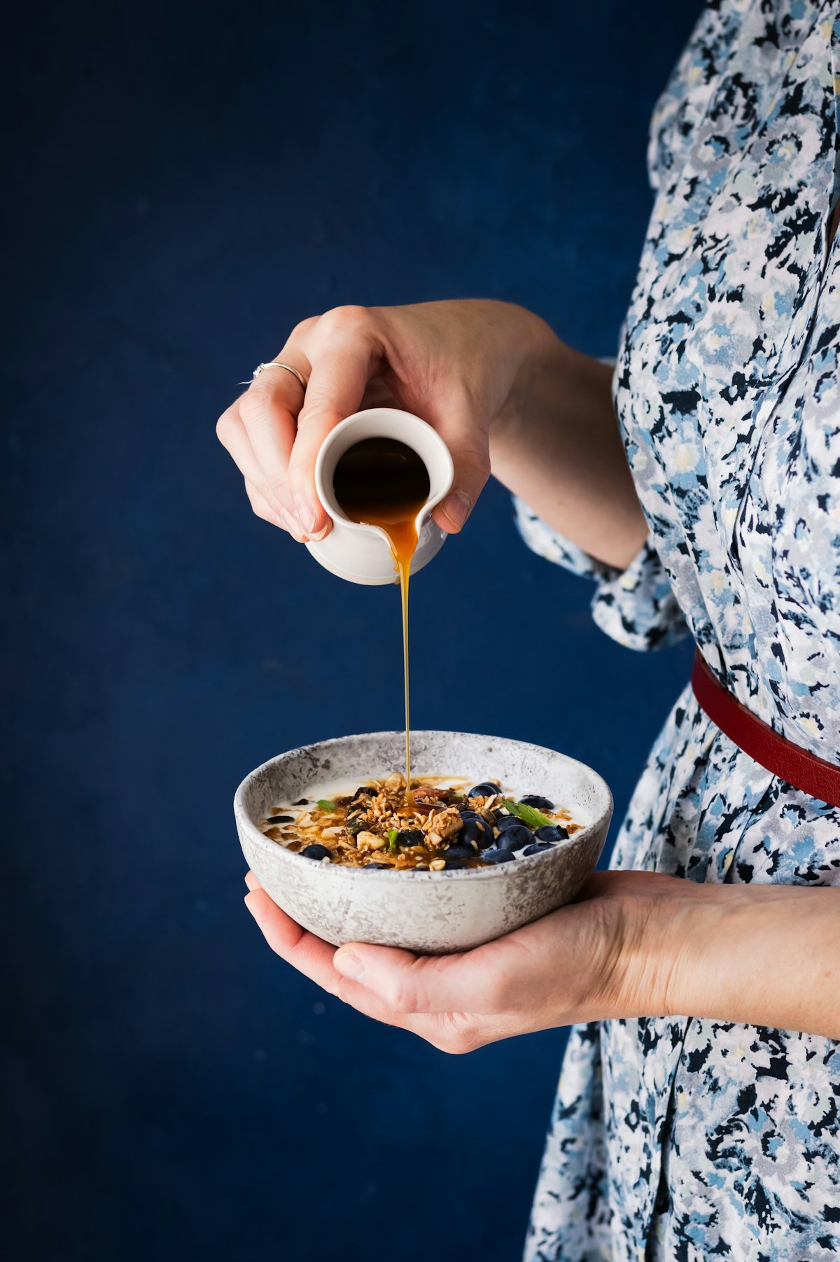 A person enjoying a bowl of breakfast at home
